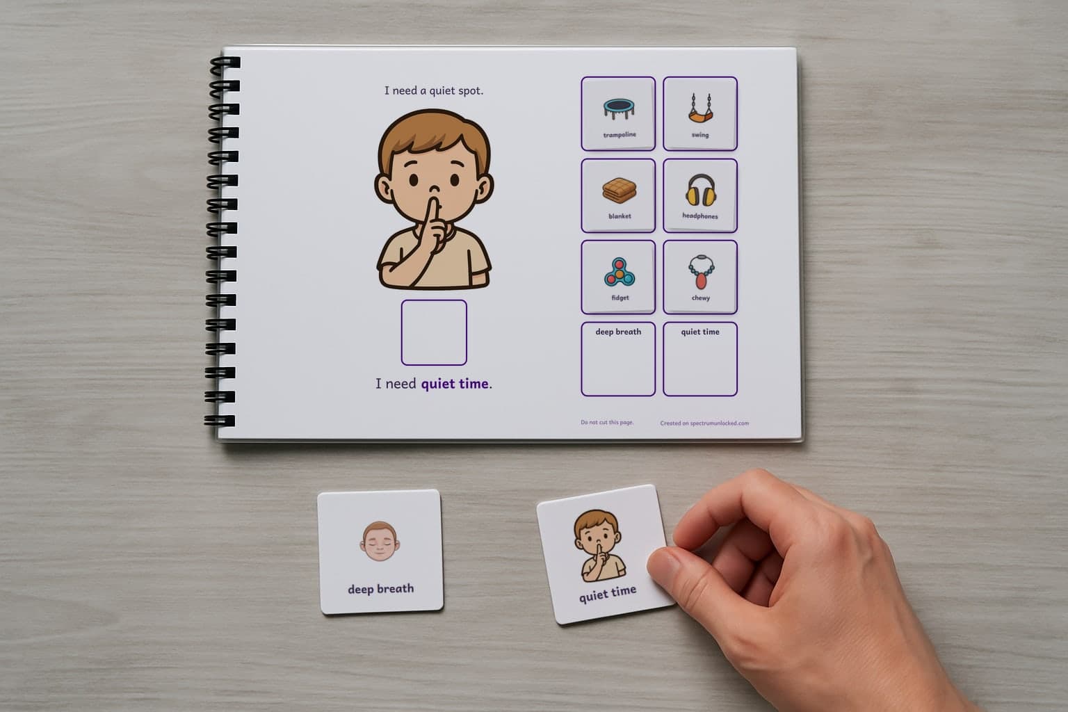 The Sensory Breaks adapted book with its picture cards stored on the choice column, the last two loose on the table