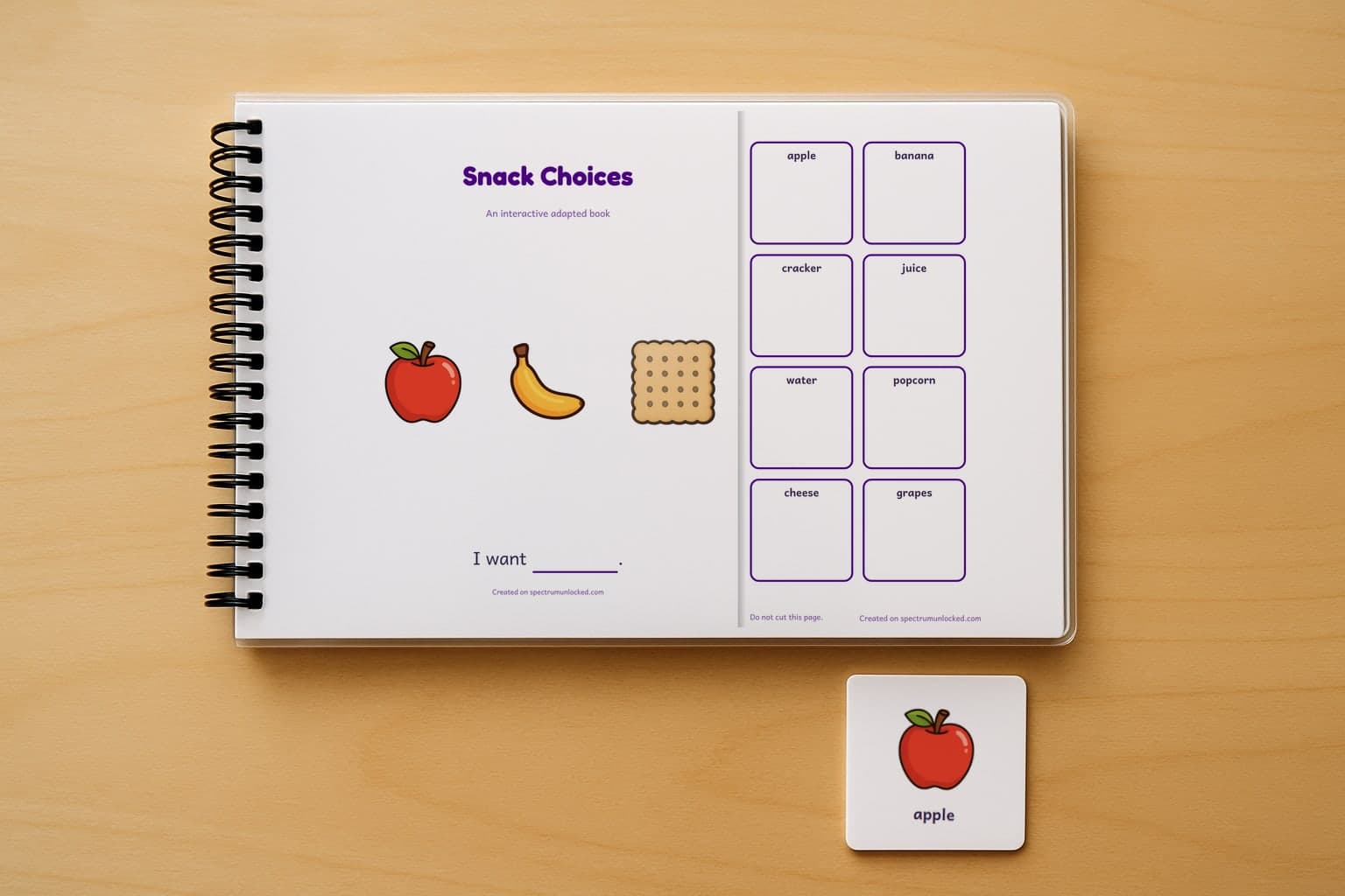 The Snack Choices adapted book closed on a table, its cover facing up, one picture card beside it