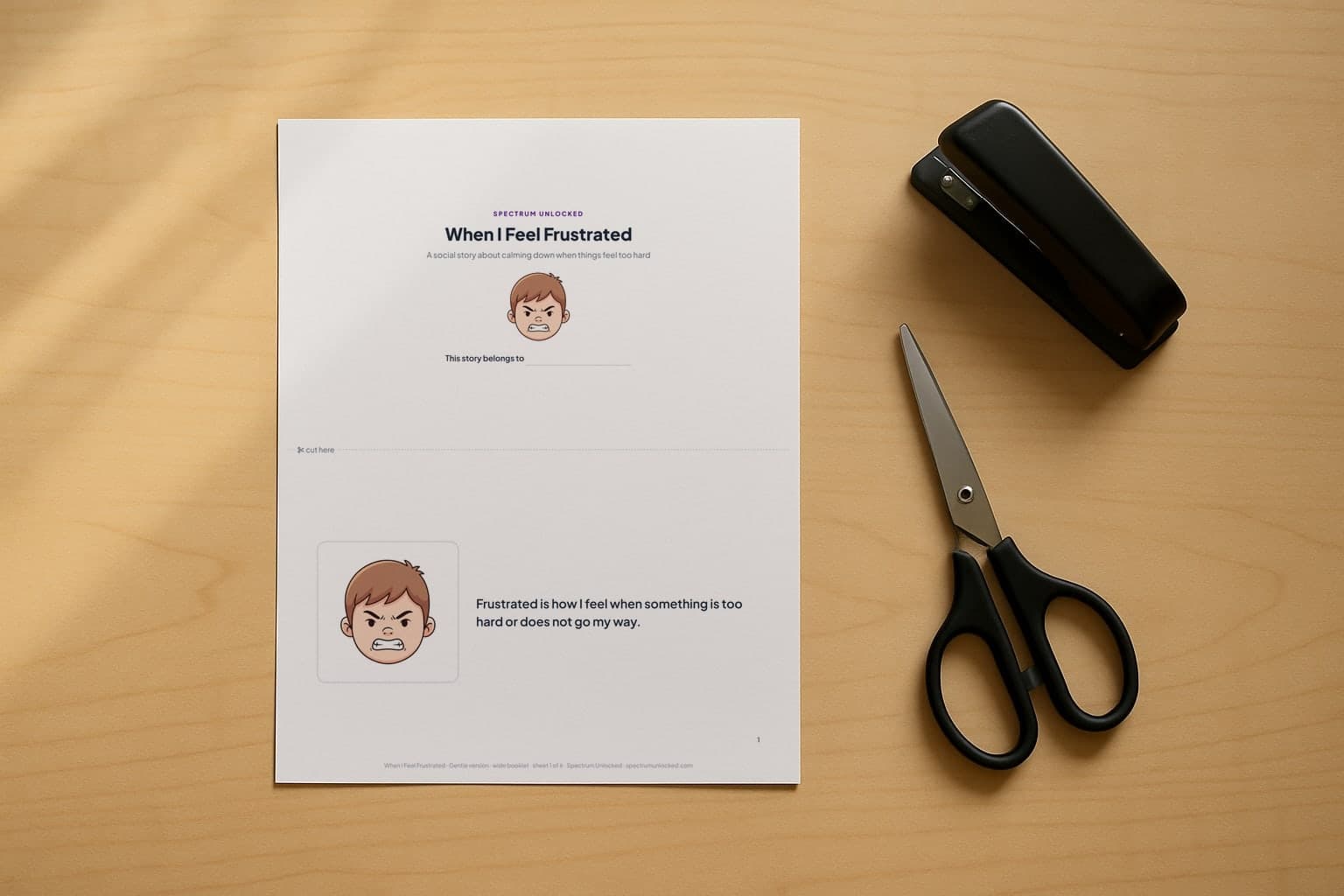 The When I Feel Frustrated social story printed two pages to a Letter sheet, scissors and a stapler beside it before the cut